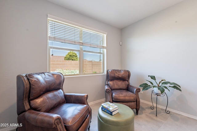 sitting room featuring baseboards