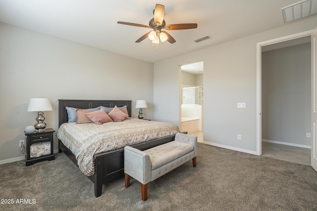 carpeted bedroom featuring ensuite bath, baseboards, visible vents, and ceiling fan