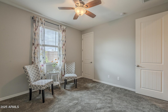 unfurnished room with carpet flooring, a ceiling fan, and baseboards