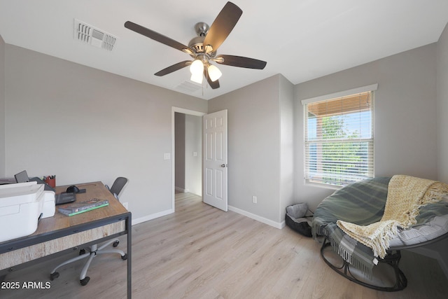 5439 W Odeum Ln, Phoenix, AZ 85043 - home office with light wood-type flooring and a ceiling fan