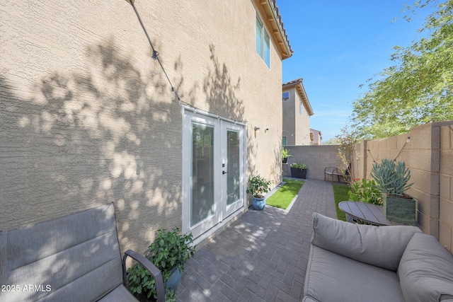 5439 W Odeum Ln, Phoenix, AZ 85043 - wooden deck featuring a fenced backyard, a patio, and french doors