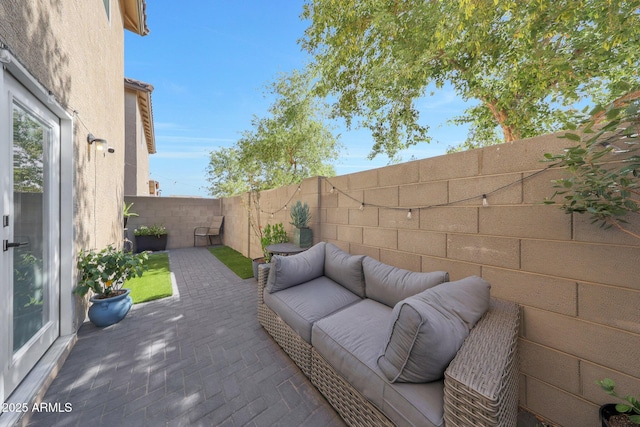 5439 W Odeum Ln, Phoenix, AZ 85043 - fenced backyard featuring a patio and an outdoor living space