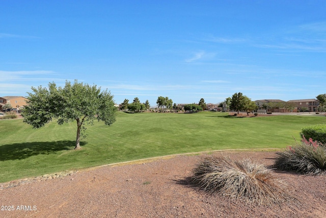 5439 W Odeum Ln, Phoenix, AZ 85043 - view of community with a lawn