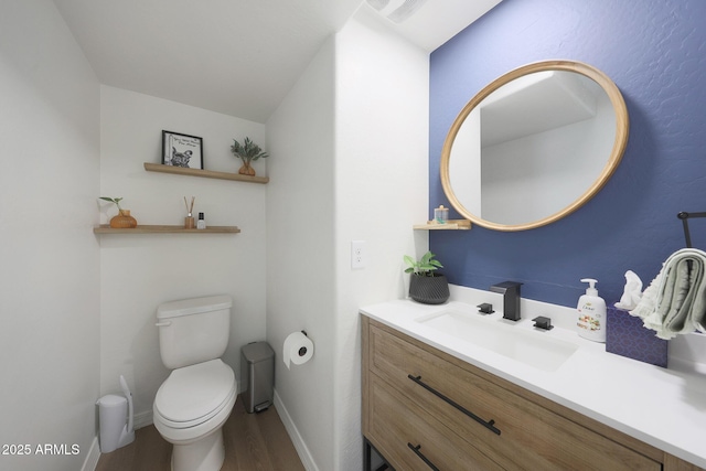 5439 W Odeum Ln, Phoenix, AZ 85043 - half bathroom with wood finished floors and vanity