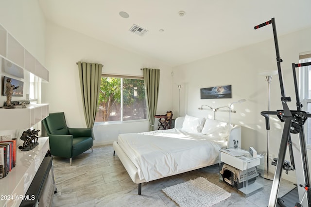 bedroom featuring vaulted ceiling