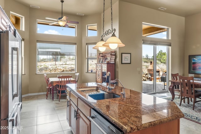 11880 N Cielo Grande, Prescott, AZ 86305 - kitchen with a towering ceiling, ceiling fan, a sink, and appliances with stainless steel finishes