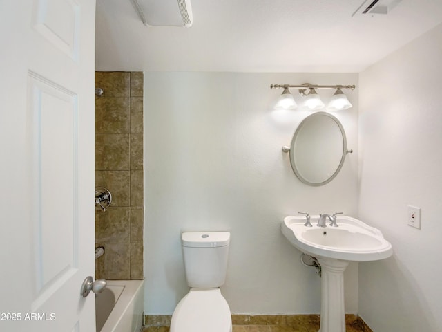 bathroom with toilet and sink