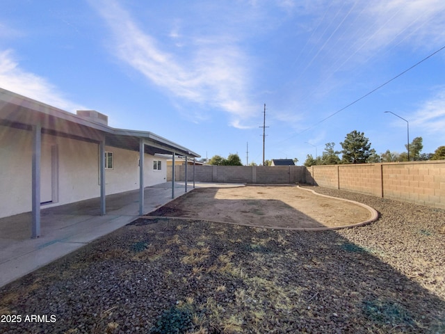 view of yard featuring a patio area