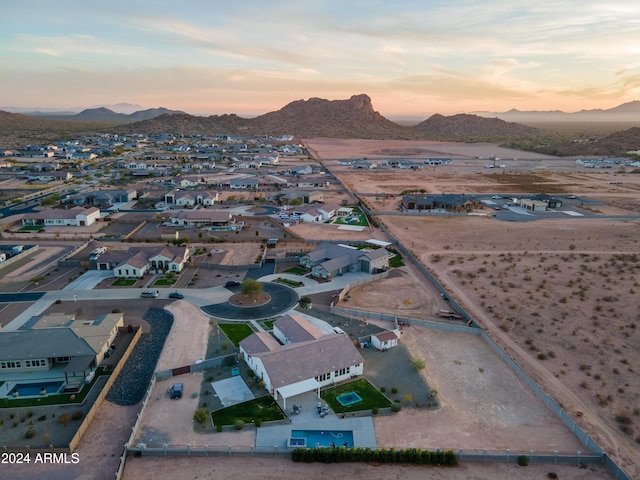 aerial view at dusk with a mountain view