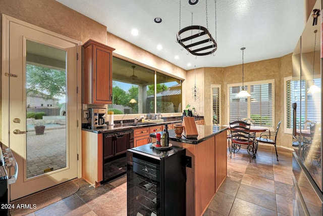 kitchen with wine cooler, sink, decorative light fixtures, a center island, and dishwasher