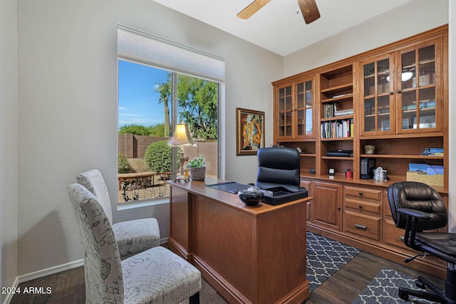 office space featuring ceiling fan and dark hardwood / wood-style floors