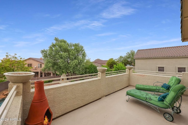 view of patio with a balcony