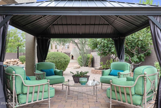 view of patio / terrace with a gazebo and outdoor lounge area