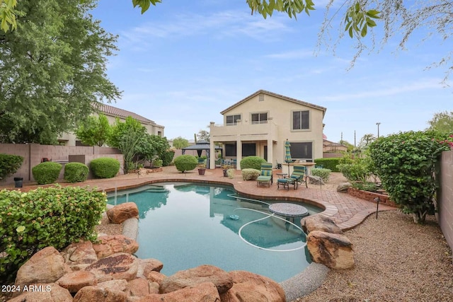 view of swimming pool featuring a patio