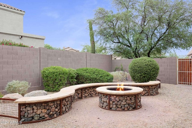 view of patio / terrace featuring a fire pit