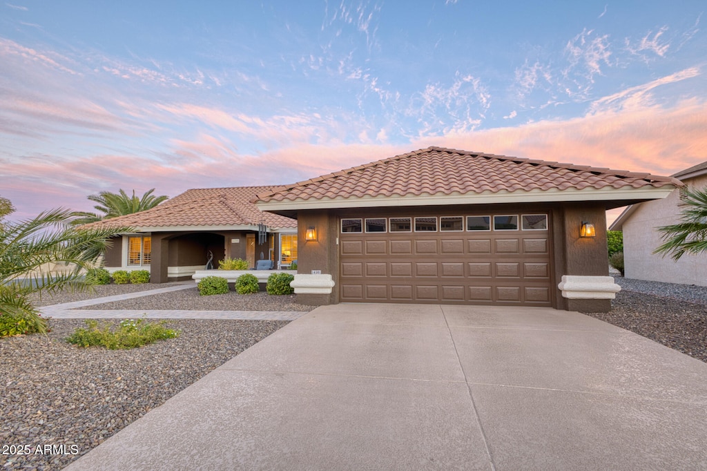 view of front of property with a garage