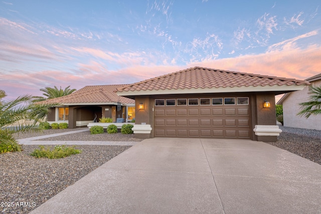 view of front of property with a garage