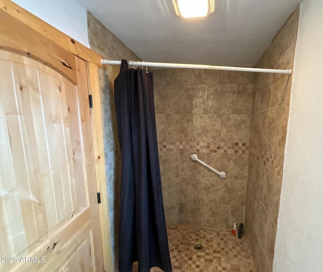 bathroom featuring a stall shower