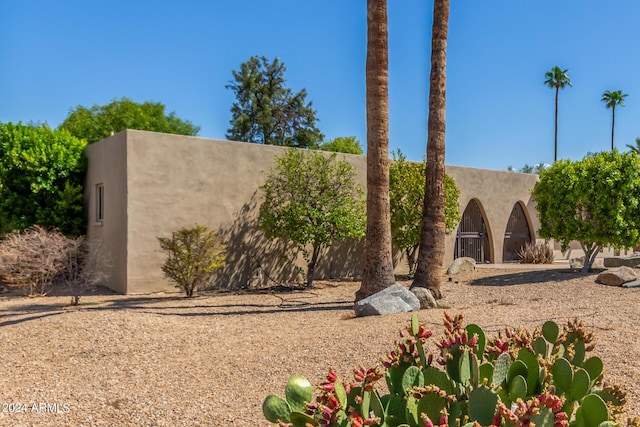 exterior space featuring stucco siding