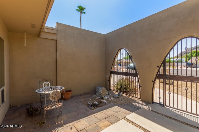 view of patio / terrace with a gate