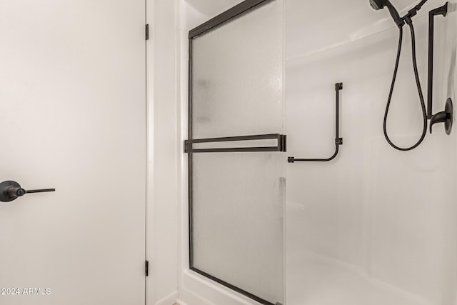 bathroom with an enclosed shower