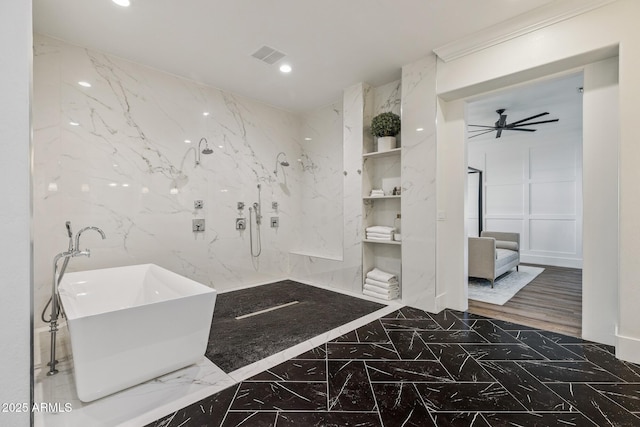 2625 N 24th St Unit 15, Mesa, AZ 85213 - bathroom with marble tiled floors, stone wall, a freestanding bath, recessed lighting, and a ceiling fan