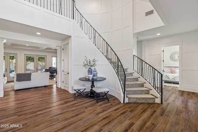 2625 N 24th St Unit 15, Mesa, AZ 85213 - staircase with a decorative wall, wood finished floors, ornate columns, french doors, and recessed lighting