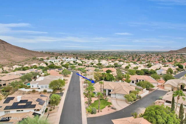 birds eye view of property featuring a residential view and a mountain view