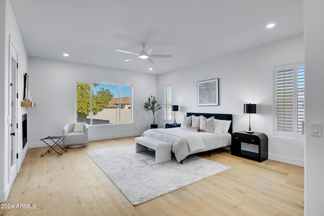 bedroom featuring ceiling fan and light wood-type flooring