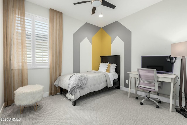 bedroom with baseboards, carpet floors, and ceiling fan