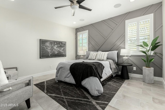 bedroom with recessed lighting, ceiling fan, and baseboards