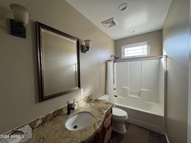 full bathroom featuring shower / tub combination, vanity, and toilet