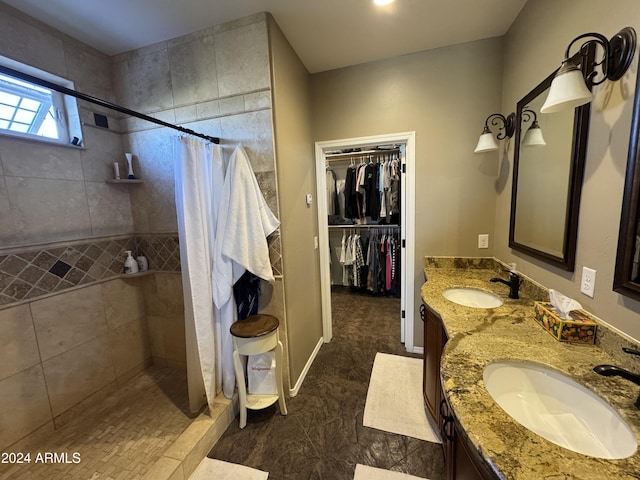 bathroom featuring vanity and walk in shower