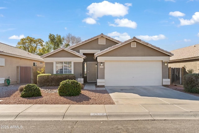 single story home featuring a garage