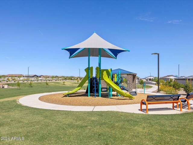 community play area featuring a yard