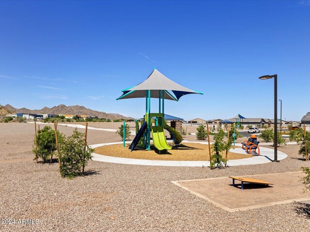 community playground with a mountain view