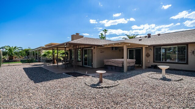 back of house with a patio area