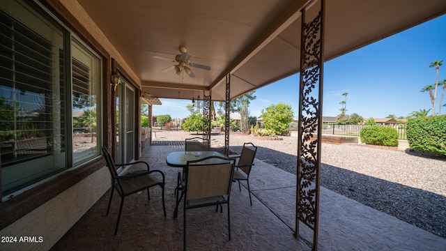 view of patio featuring ceiling fan