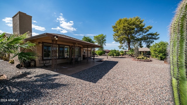 view of yard with a patio area