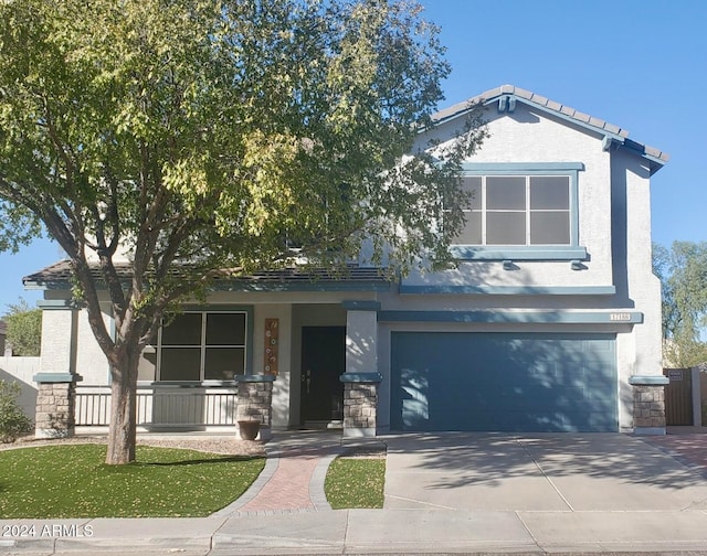 view of front of property featuring a garage