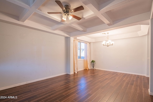 unfurnished room featuring dark hardwood / wood-style floors, beam ceiling, coffered ceiling, and ceiling fan with notable chandelier