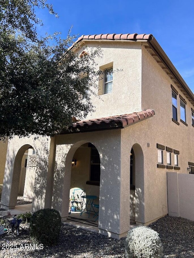 rear view of property with a patio area