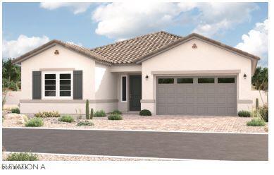 mediterranean / spanish-style home featuring driveway, a tiled roof, an attached garage, and stucco siding