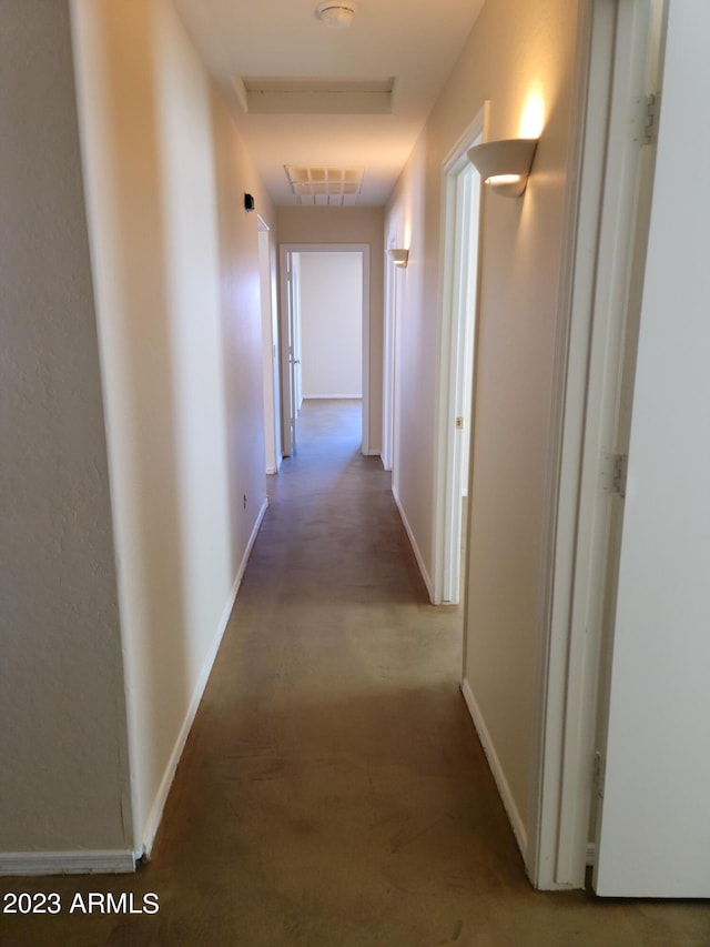 corridor with visible vents and baseboards