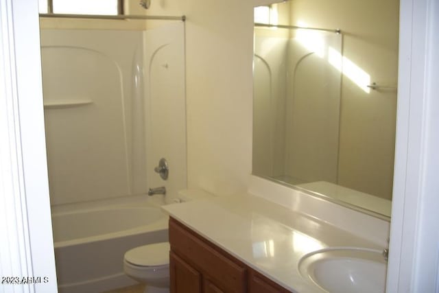 full bathroom with tub / shower combination, vanity, and toilet