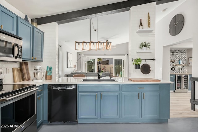 kitchen with pendant lighting, sink, blue cabinets, vaulted ceiling with beams, and stainless steel appliances