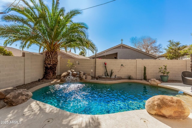 view of swimming pool with pool water feature