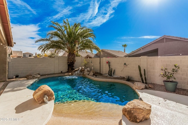 view of swimming pool featuring pool water feature