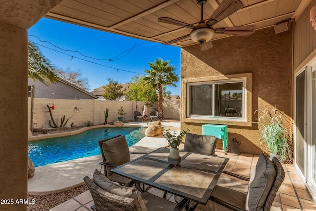 view of pool featuring a patio and ceiling fan