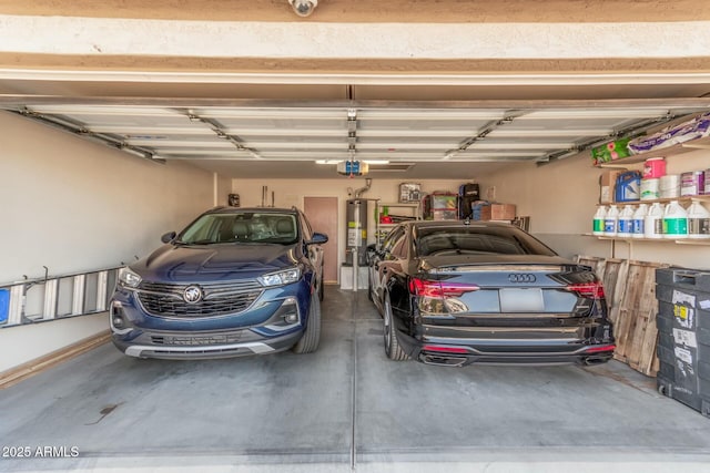 garage featuring gas water heater and a garage door opener